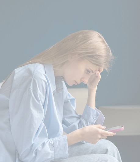 Woman-Looking-at-Phone_edited